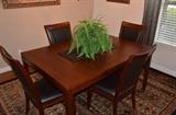 Beautiful Wood Dining Table and Chairs. Large Area Rug
