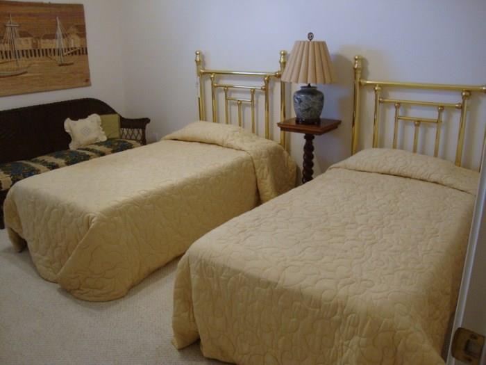 Matching Brass twin Beds