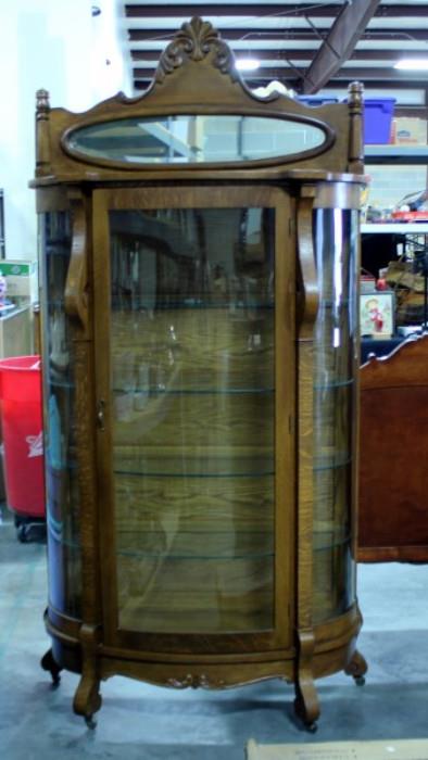 Curved Front Curio Cabinet w Interior Lighting, Mirror, Glass Shelves, Key, Wheels, 79"H 36"W 15"D     http://bid.auctionbymayo.com/view-auctions/catalog/id/7786/lot/1040279/?url=%2Fview-auctions%2Fcatalog%2Fid%2F7786%2F