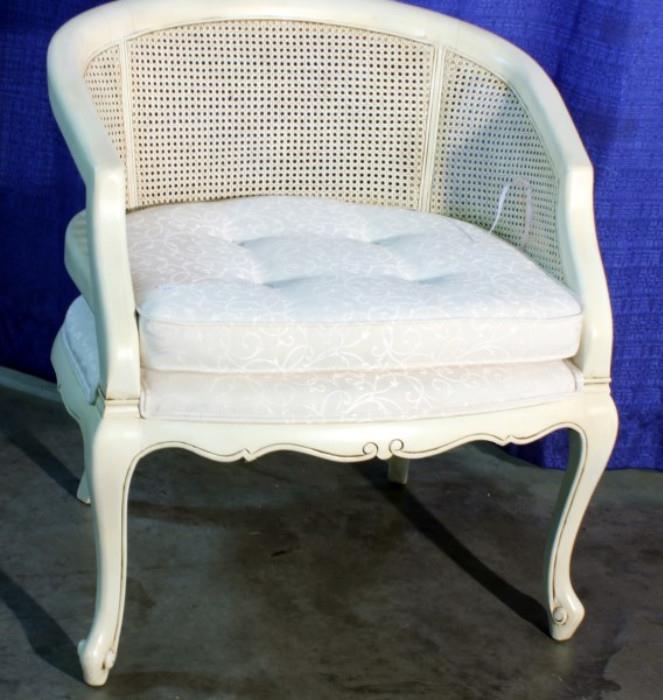 Curved Back Occasional Chair With Woven Back, White Cushion with Floral Design Upholstery http://bid.auctionbymayo.com/view-auctions/catalog/id/7786/lot/1040318/?url=%2Fview-auctions%2Fcatalog%2Fid%2F7786%2F