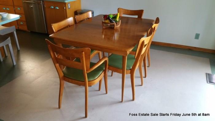 Heywood Wakefield dining table with two leaves and custom pads and 6 dogbone chairs