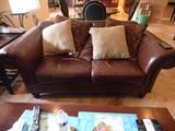 LEATHER LOVESEAT $200