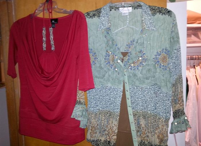 Women's clothing in many sizes...lots are new with tags!!!