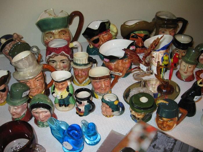 assortment of character jugs