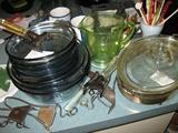 Pyrex glass cooking pots with handles.  Green measuring cup from depression era.