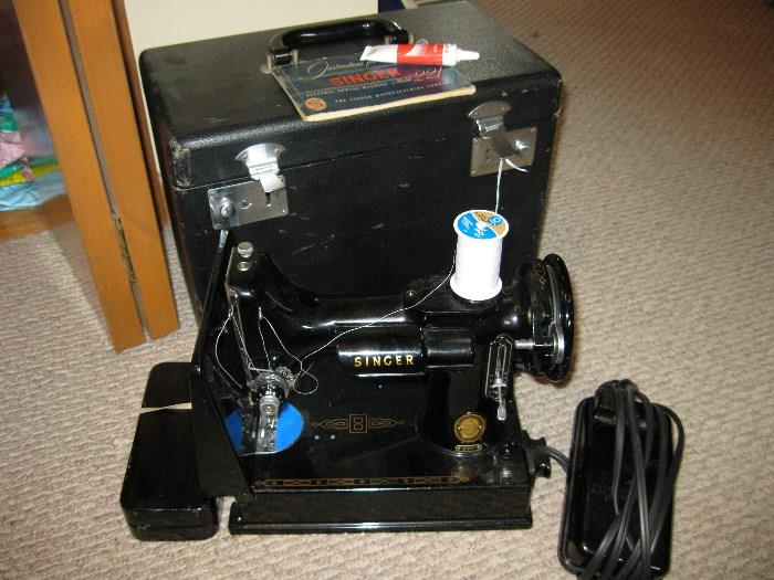 One of two Singer Featherweight sewing machines model 221