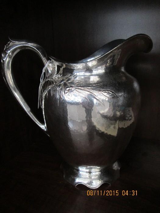 This is a rare Gorham/Durgin sterling water pitcher in the "Jonquil" pattern.  The detail is awesome !  See next few pictures