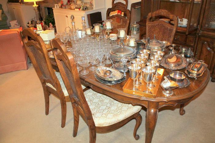Bernhardt dining table with 2 leaves and 6 chairs - silverplate, glassware, and entertaining items (Note - china cabinet is not for sale)