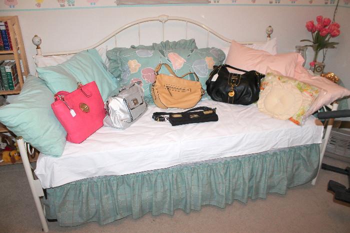 White metal day bed (with trundle bed) and designer purses