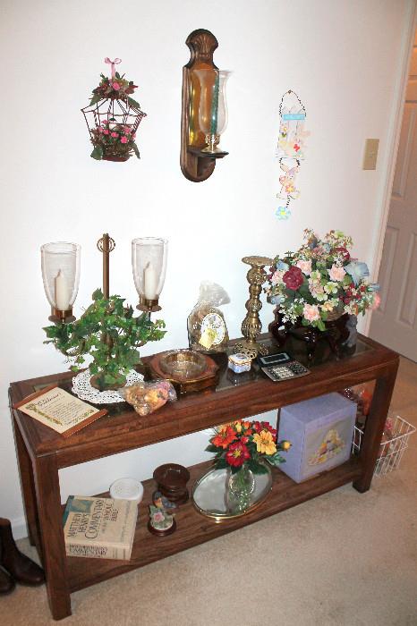 Glass-top console table and home decor