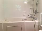 Built-in, almost new, walk-in tub system, open to bid.