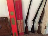 Copper firescreen.  Two antique rifles.  BB gun and vintage gun boxes.