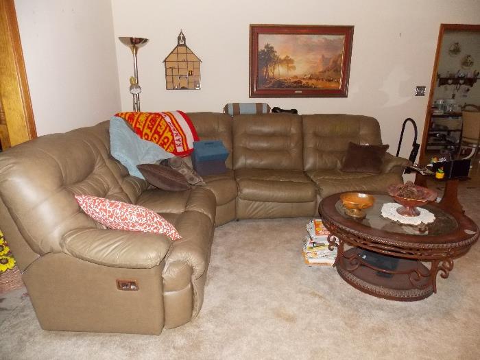 Leather sectional sofa with end recliner, beautiful round coffee table