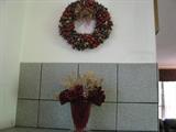 Wreath with a basket vase.