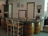 Barrel bar and chairs.