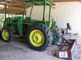 John Deere Tractor with 7 attachments. Purchase price is 20k.