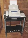 fax machine, arrow heads, small computer desk