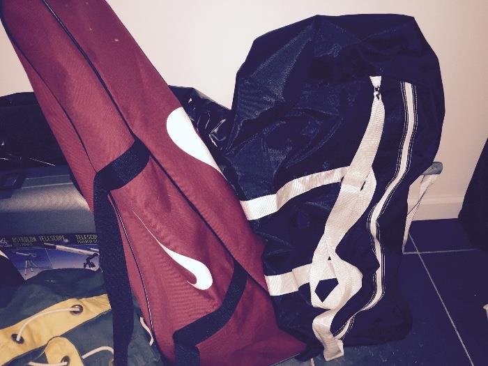 Sports Equipment throughout, here are a couple baseball bags with full contents of baseball stuff inside