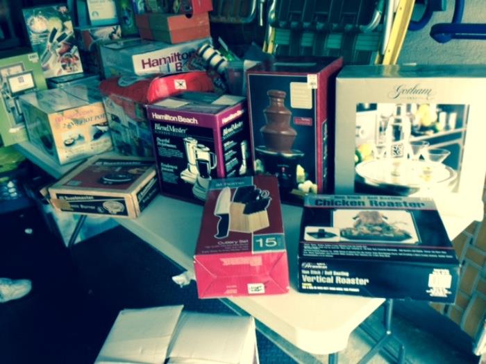 Boxes of unopened Kitchen Gadgets and other cool stuff