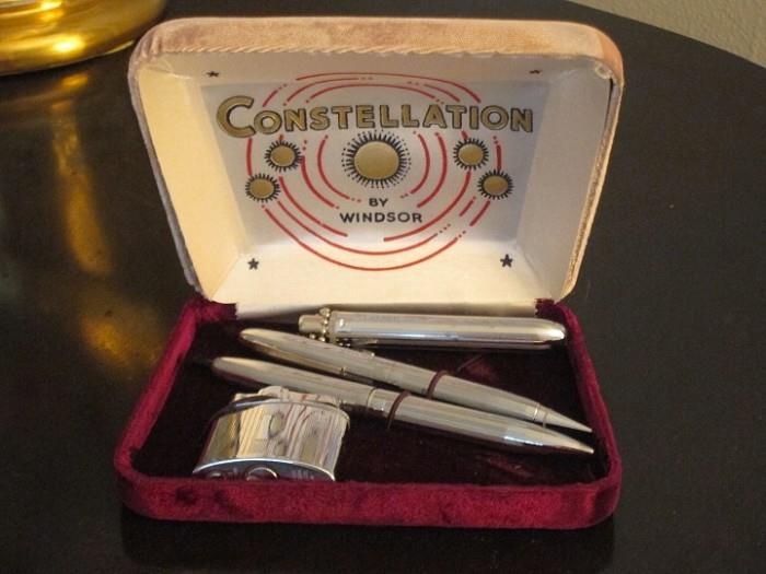1950s Constellation desk set with ballpoint pen, pencil, key fob and lighter. New in box.