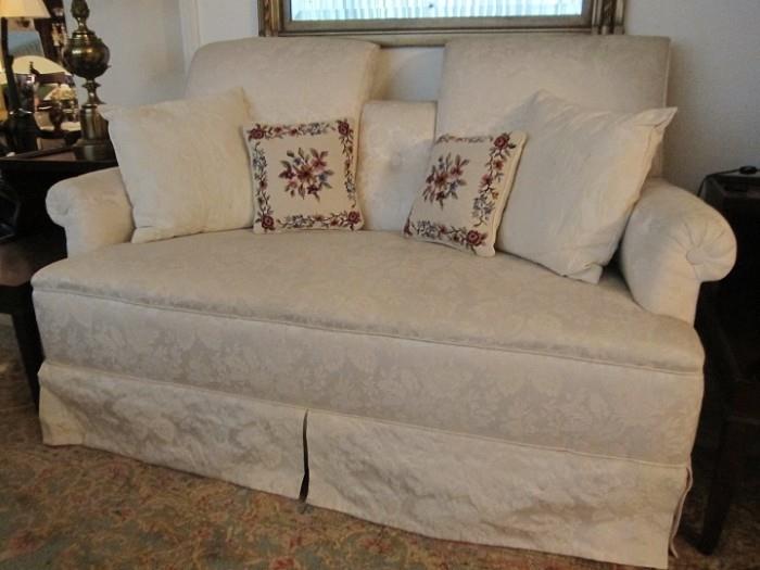 Late 19th to early 20th century upholstered settee with two matching side chairs.