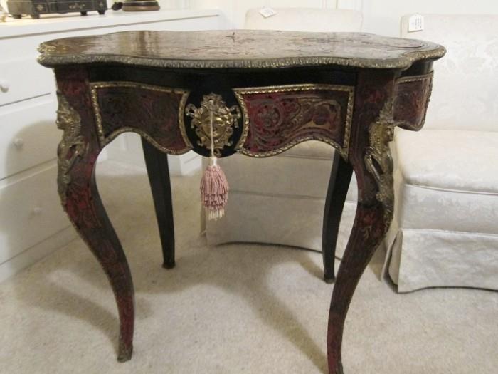 Late 19th century Louis XVI style ormolu-mounted boule side or center table.