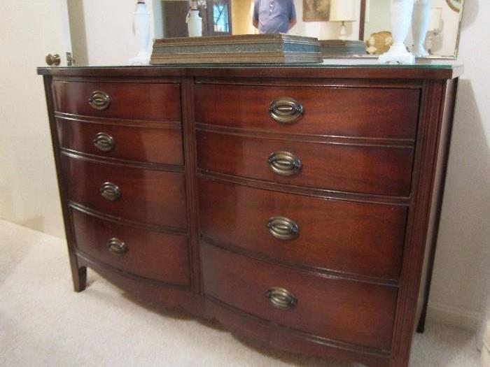 1940s mahogany double bow-front chest of drawers in excellent condition.