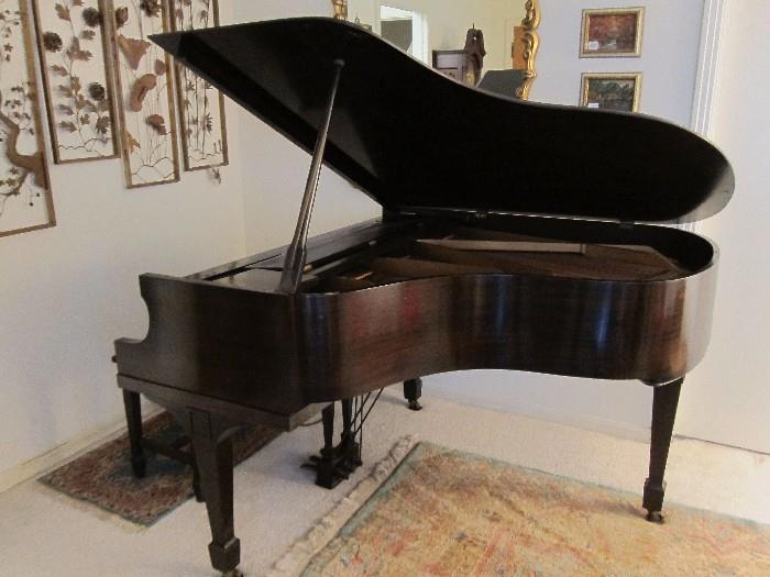 1945 Lester mahogany grand piano.