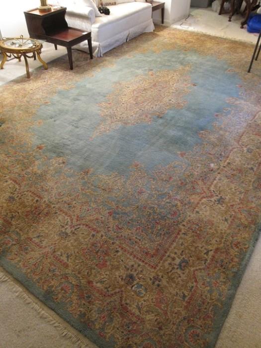 Semi-antique Kirman hand-knotted wool rug.