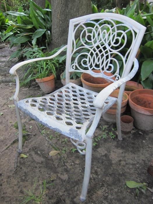 Lots of nice patio furniture including this great armchair.