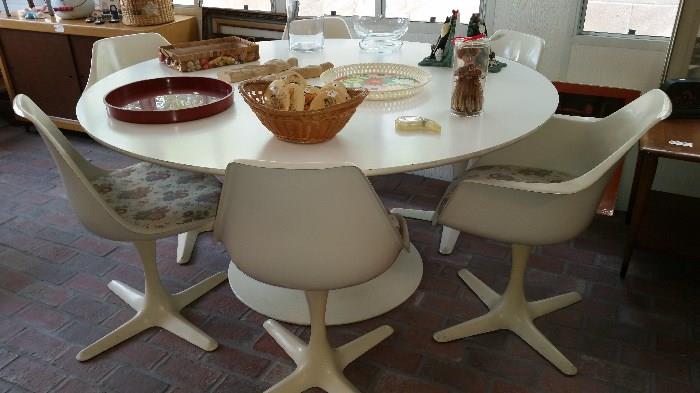 Amazing mid century Burke 60" dining set with 6 chairs.