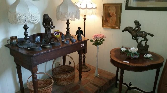 Lots of antique furniture and figurines.