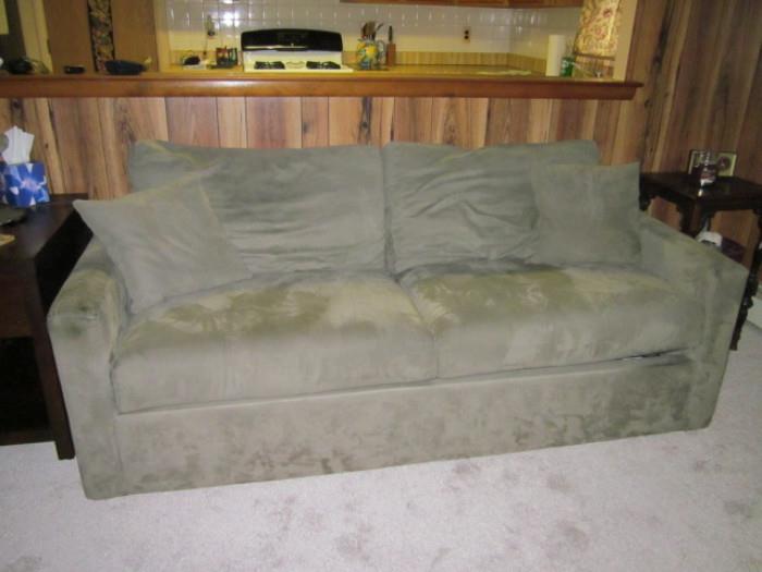 grey/green microfiber sofa sleeper, mattress still in plastic