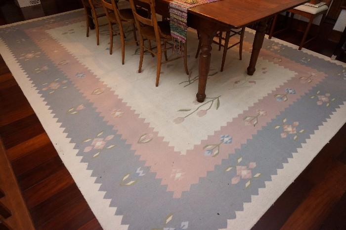 Approximately 9.5' x 13.25' area rug