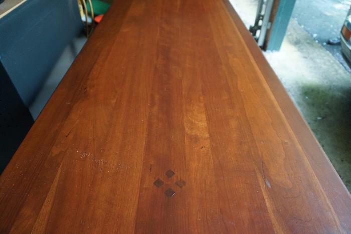 Cherry drop leaf table close up