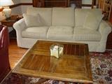 Arhaus "Baldwin" sofa.  There is also a matching loveseat.  Foreground is an Ethan Allen coffee table.