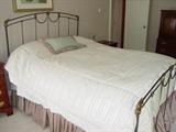 Queen size iron bed.