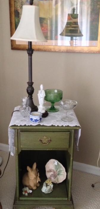 Vintage Bronze Lamp atop a vintage cabinet