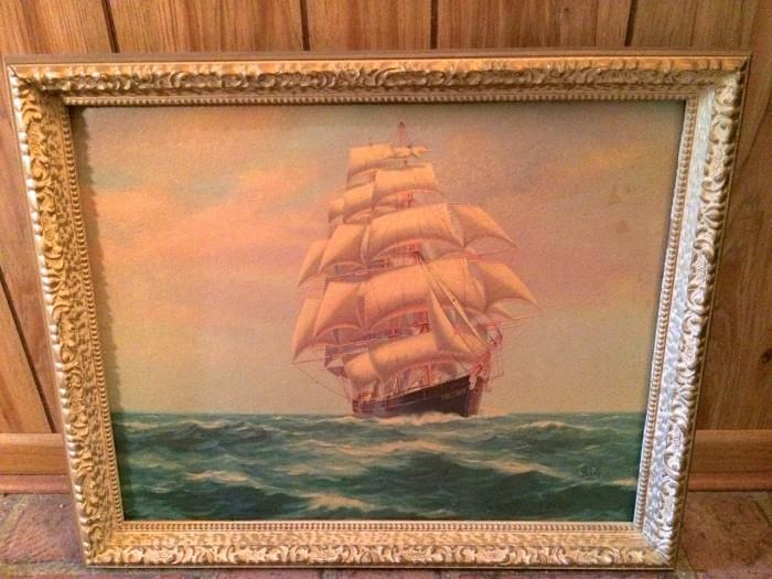 Vintage sailing ship in ornate frame