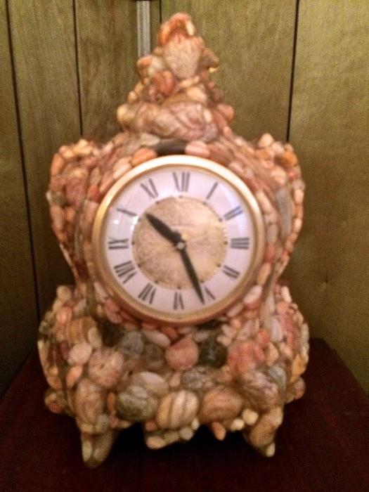 Fascinating ornate clock with shells for casing