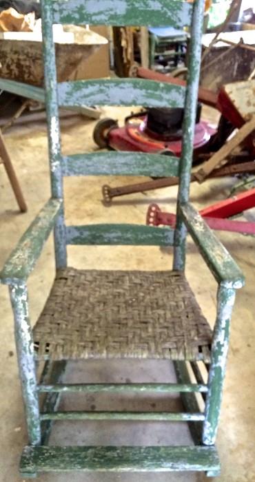 Shabby chic rocker with footrest and woven seat, super cool!