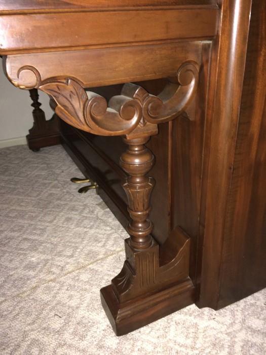 Detail of legs on antique piano