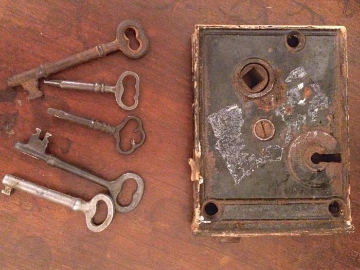 Antique skeleton keys and lock face