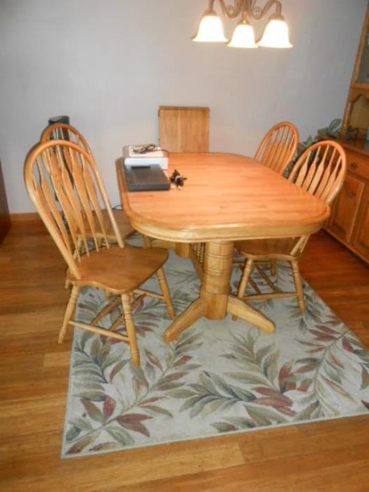 quality made double pedestal table with two leaves, windsor style chairs with arrow backs, floor rug