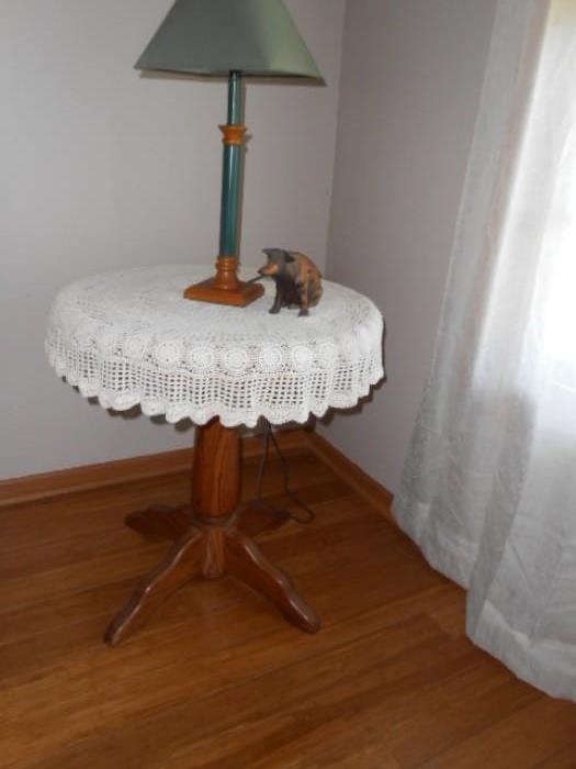 pedestal  side table , round top, stick style lamp
