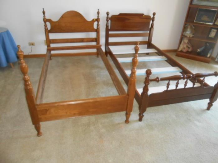all wood , classic twin bed frames.  Plus linens etc