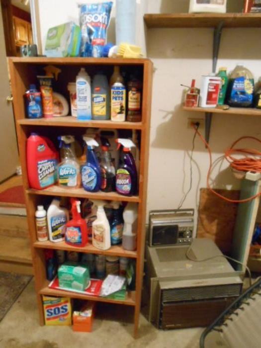 lots of cleaning supplies,  AC unit 