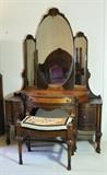 Dressing table and stool that is part of the bedroom suite.