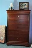High boy chest that is part of the Thomasville bedroom suite.