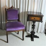 A pretty velvet covered side chair and a small chair side or bedside table with drawer
